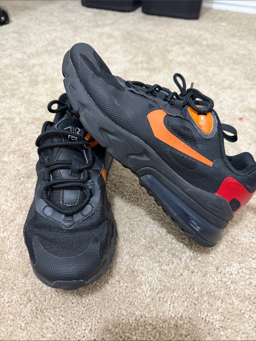Nike Kids Black Sneakers with Orange Accents